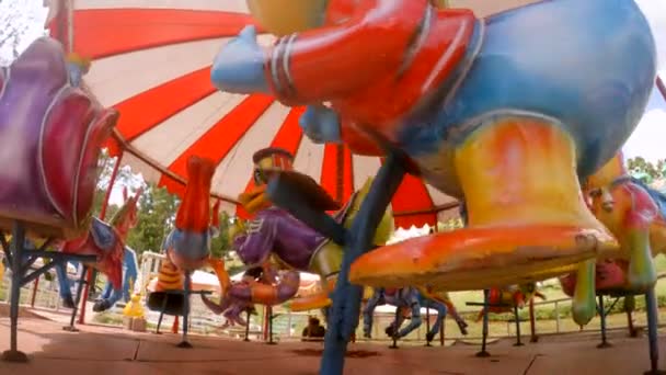 Colorful Riding Toys on Merry-Go-Round — Stock Video