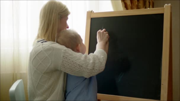 Mother Teaching Son Numbers — Stock Video