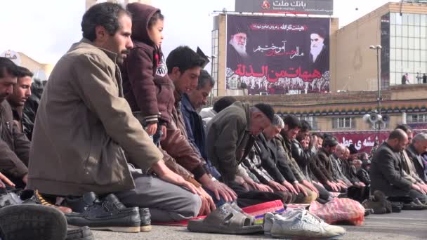 Muslim men taking part in praying session — Stock Video