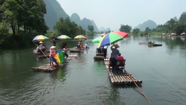 Touists travel on rafts in China — Stock Video