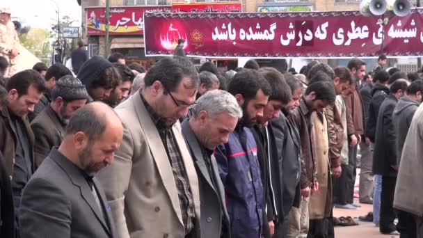 Muslim men taking part in praying session — Stock Video