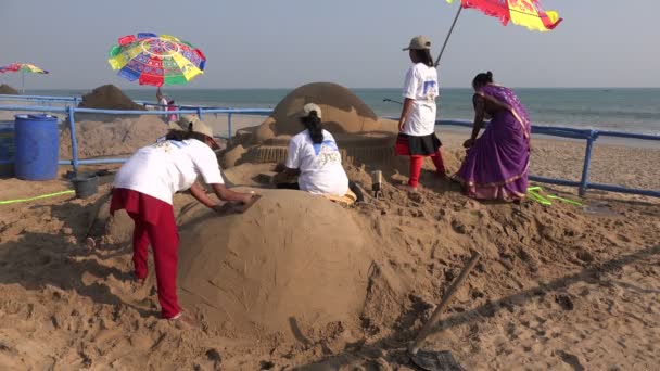 Artists take part in a sand festival — Stock Video