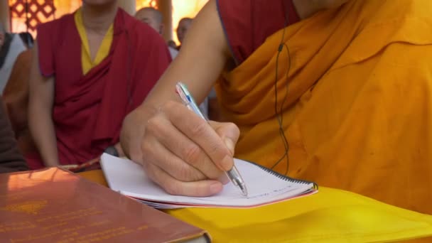 An unidentified monk translates the public teachings — Stock Video