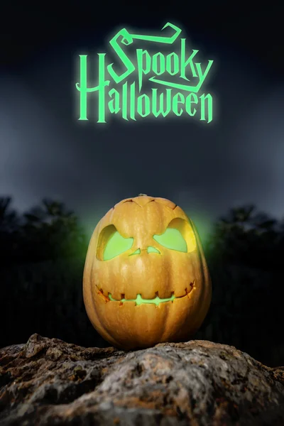 Spooky Halloween neon pumpkin in on a rock in the darkness — Stock Photo, Image