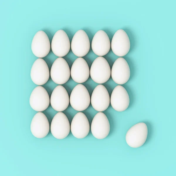 Uova in fila su sfondo turchese — Foto Stock