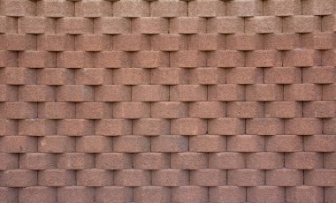 Açık kahverengi geometrik şekilli tuğla duvar. Derinlik hissi. Doku. Arkaplan.