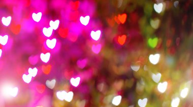 Noel Bokeh etkisi. Kalp şekilli soyut bir arkaplan. Şenlik ışıkları. Geçmişi. Pankart. Odaklanamıyorum.