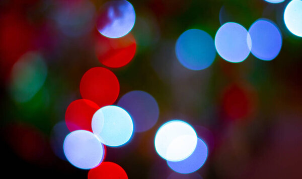 Bokeh effect with christmas lights. Background. Banner. Out of focus.