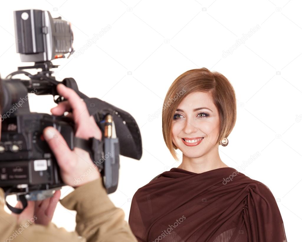 Young attractive woman with a beautiful smile gives an interview.