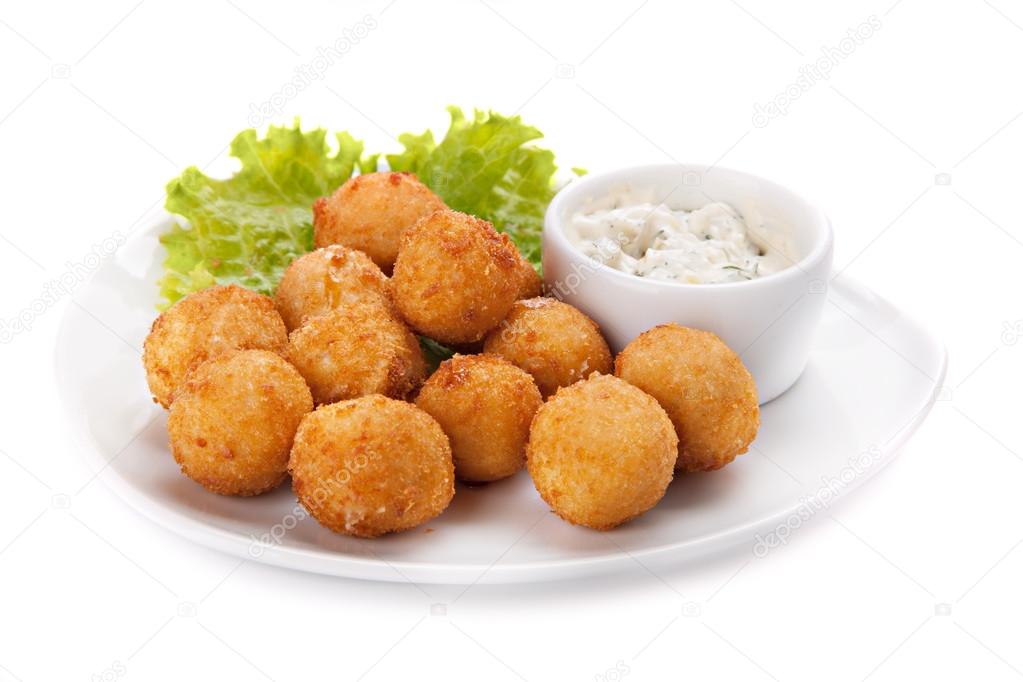Deep fried cheese balls whith  lettuce and sauce
