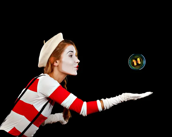 Portrait of the female MIM comedian catches bubbles, isolated on — Stock Photo, Image