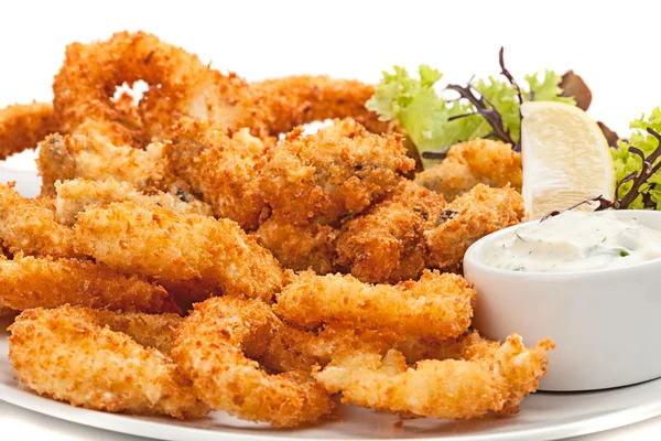 Plate of fried in batter squid  with sauce. — Stock Photo, Image