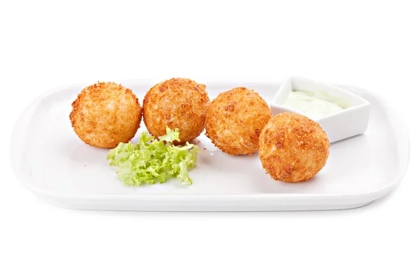 Deep fried cheese balls with lettuce and sauce. — Stock Photo, Image