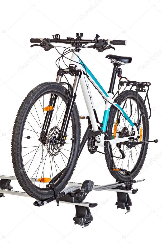 Bicycle setting with Roof Mounted Bike Carriers.