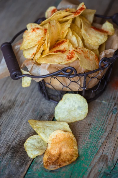 Potato chips in a metal basket