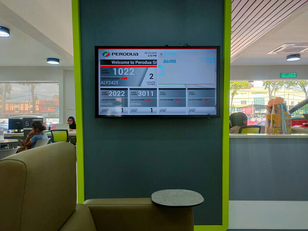 Sri Manjung,Perak-29 Oct 2025:The image displays a digital queue management system at a Perodua service center.