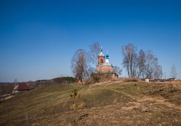 Church with blue domes on the hill — Stock Photo, Image