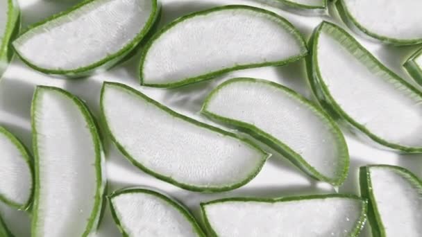 Closeup Aloe Vera sliced slice rotation. Natural medical plant. Organic cosmetics, alternative medicine. Top view. — Stock Video