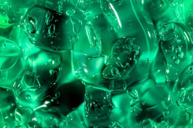 Sıvı krem jöle, köpüklü yeşil mavi kozmetik doku.