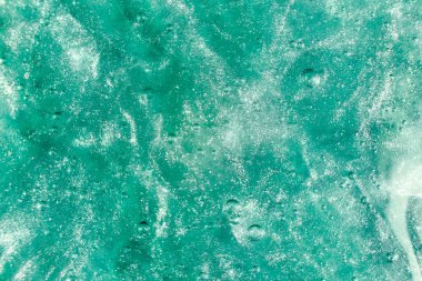 Sıvı krem jöle, köpüklü yeşil mavi kozmetik doku.