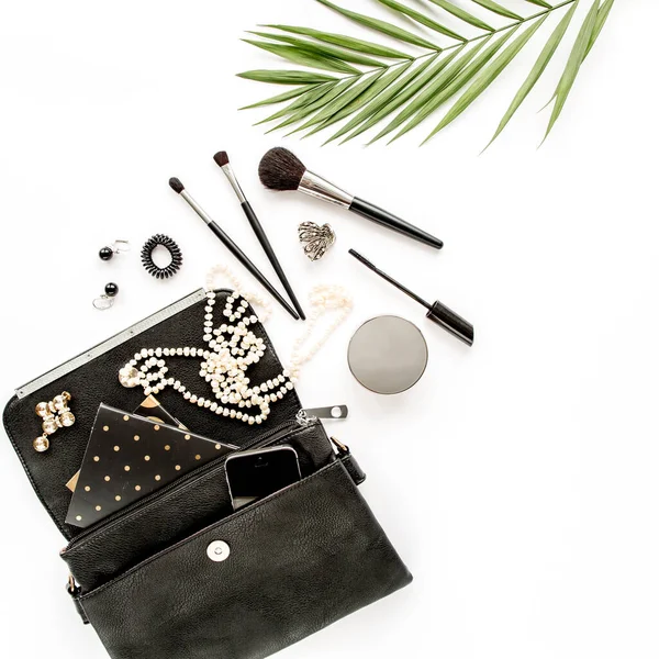 Makeup tools. Home office workspace. Female fashion, makeup brushes, cup of coffee on white background. Flat composition. Top view. Flat lay.