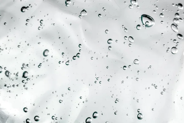 Flytande kräm gel, grön blå kosmetisk konsistens med bubblor — Stockfoto