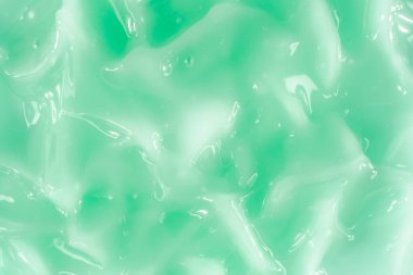 Sıvı krem jöle, köpüklü yeşil mavi kozmetik doku.