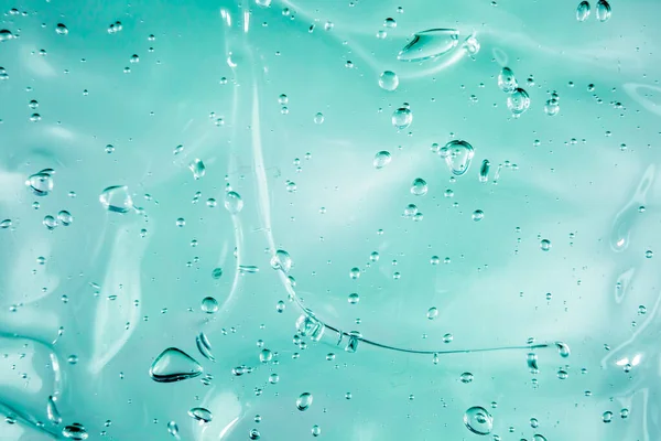 Tekutý krém gel, zelená modrá kosmetická textura s bublinkami — Stock fotografie