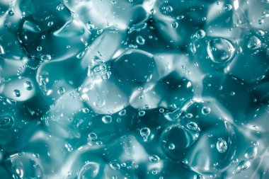 Sıvı krem jöle, köpüklü yeşil mavi kozmetik doku.