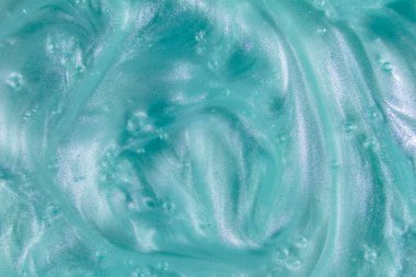 Sıvı krem jöle, köpüklü yeşil mavi kozmetik doku.