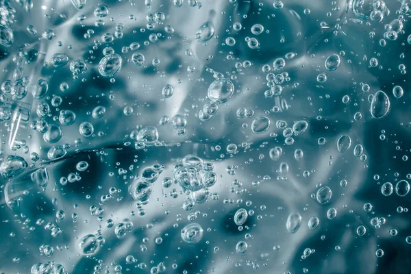 Sıvı krem jöle, köpüklü yeşil mavi kozmetik doku.