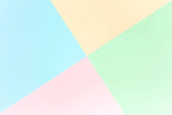 背景色:ピンク、黄色、青、緑。幾何学模様の論文.最小限のコンセプト。フラットレイ、トップビュー. — ストック写真