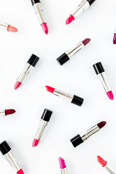 Set of color lipsticks on white background. Professional decorative cosmetics, product pomade for advertising. beauty, fashion. flat lay, top view