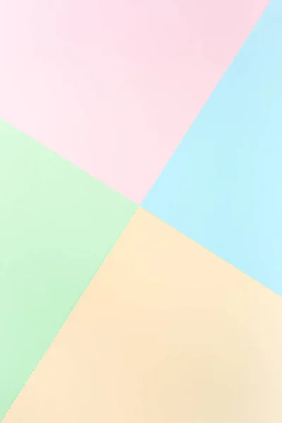 Παστέλ χρώματα φόντου: ροζ, κίτρινο, μπλε, πράσινο. Χαρτιά γεωμετρικών μοτίβων. Ελάχιστη έννοια. Επίπεδο lay, πάνω όψη. — Φωτογραφία Αρχείου