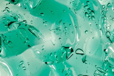 Sıvı krem jöle, köpüklü yeşil mavi kozmetik doku.