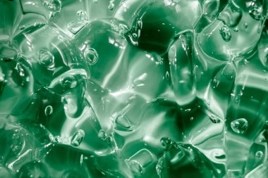 Sıvı krem jöle, köpüklü yeşil mavi kozmetik doku.