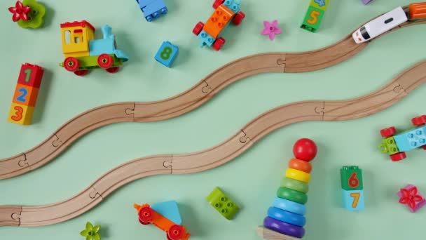 Childish Toy Wooden Railway. Toy Train Travel Along the Railway. Childs Educational Toys. Top View. Copy Space. — Stock Video