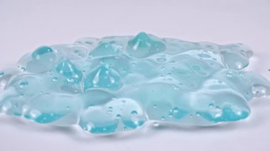 Molekül köpüklü Mavi Kozmetik Jel Kremini düşürür. Organik kozmetik, ilaç. Makro Vuruş
