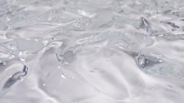 Şeffaf Kozmetik Sıvı Jel Kremli Makro Hava Baloncukları. Baloncuklu akışkan doku. Yavaş çekim 
