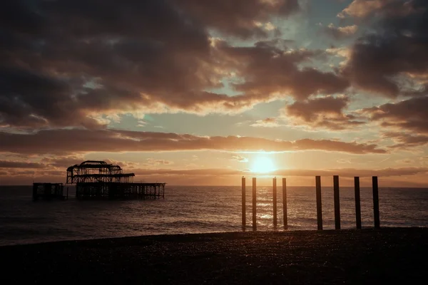 Cais de Brighton ao pôr do sol — Fotografia de Stock