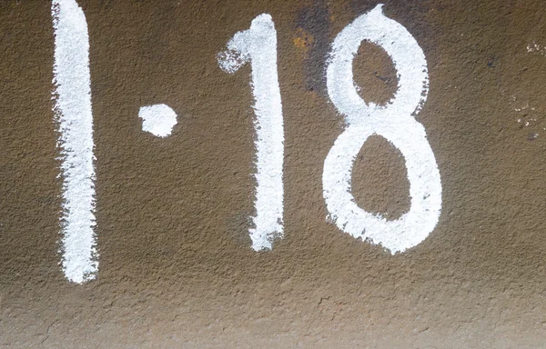 Número dieciocho en la placa metálica — Foto de Stock