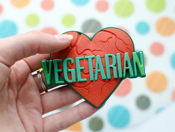 red heart with world vegetarian