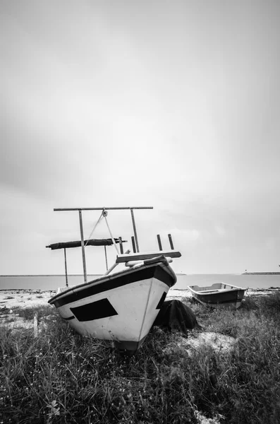 Black and white image of fisherman boat — Stock Photo, Image