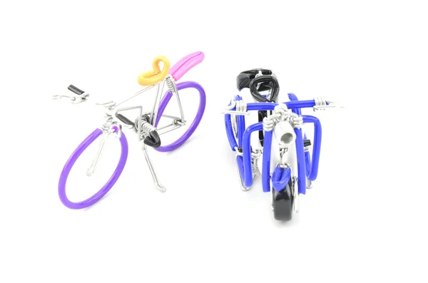 Bicycle and mini scooter made from purple, yellow, white and black color. isolated white background — Stock Photo, Image