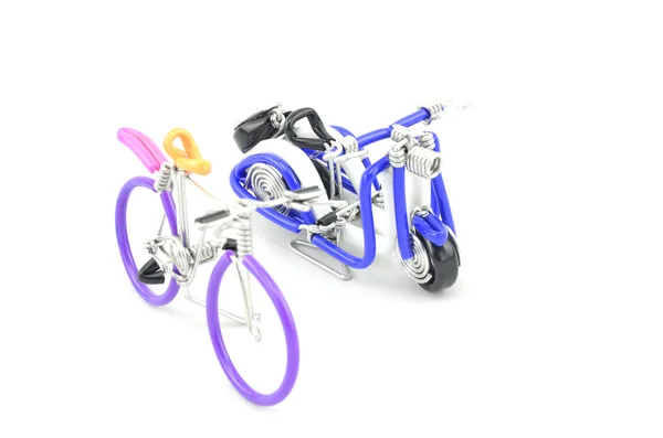 Classic bicycle and mini scooter made from wired. blue, white and purple color isolated white background — Stock Photo, Image
