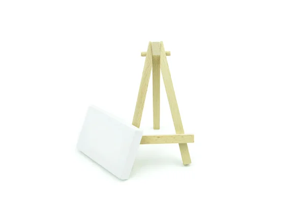 Macro canvas frame on floor with wooden stand — ストック写真
