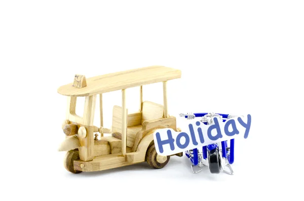 Handcrafted tuk-tuk  made from wood   with word holiday on scooter made from wire — Zdjęcie stockowe