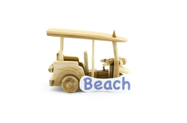 Handcrafted souvenir.thailand iconic transport,tuk-tuk  made from wood with word beach — ストック写真