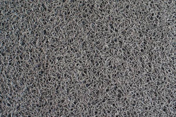 Close up winylu pyłu pułapki dywan — Zdjęcie stockowe