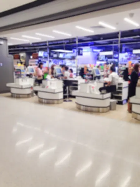 Blur cashier counter in the supermarket — Stock Photo, Image